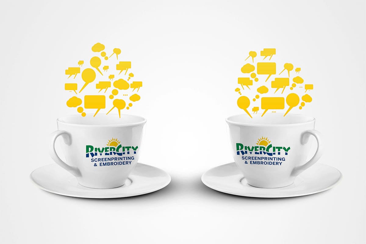 Two mugs with logos, showcasing San Antonio promotional products.